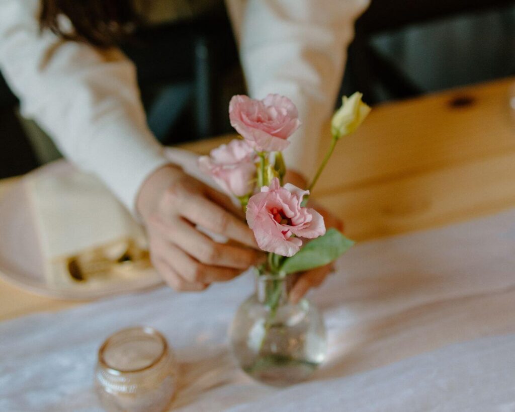 Spring wedding ideas including simple floral arrangements for reception tables.