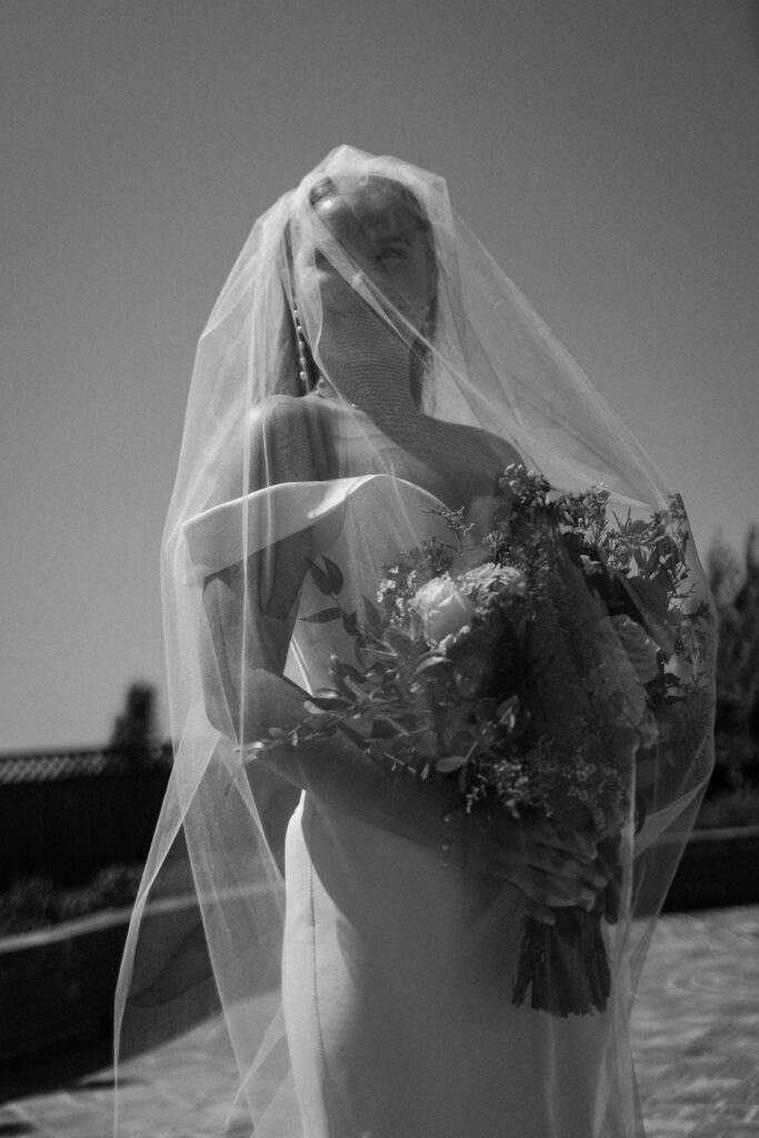 Documentary-style photographer captures stunning bride in sunlight