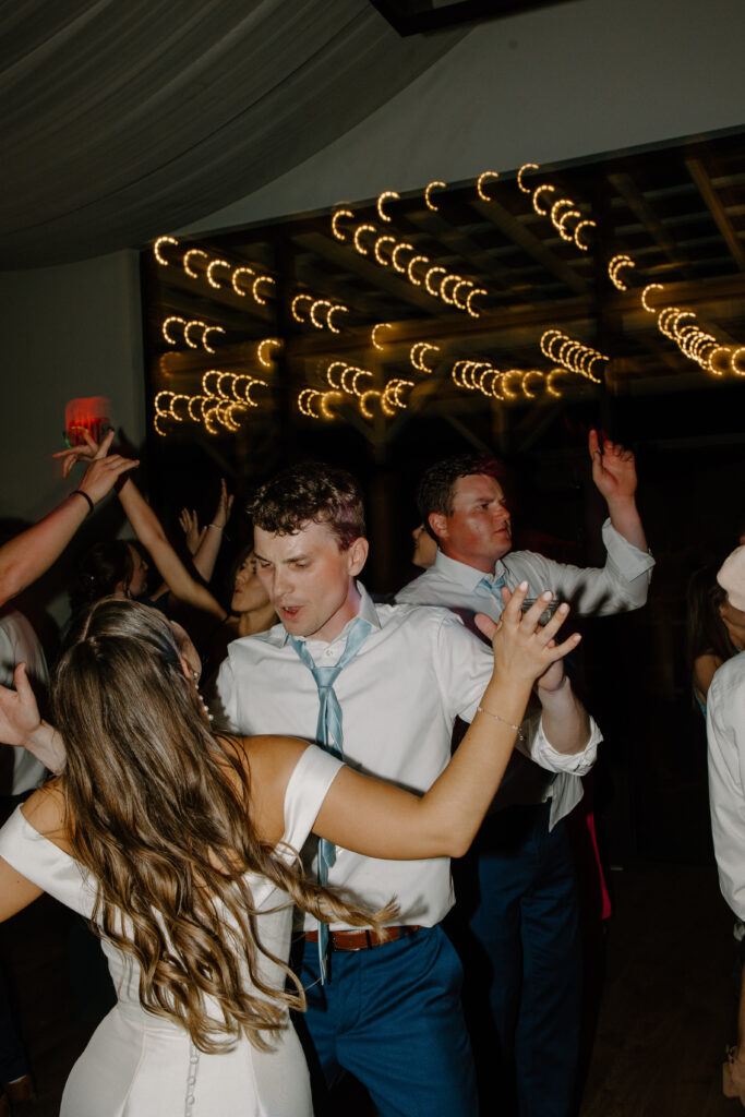 Bride and groom dance at wedding reception