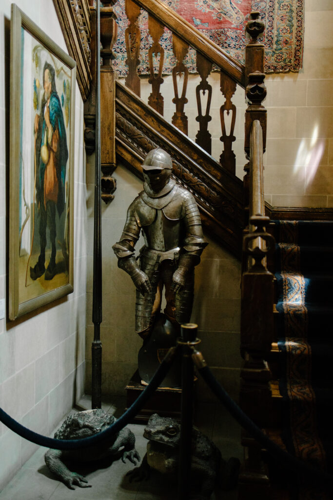 Knight of shining armor, Renaissance painting, and beautiful wooden staircase in historic Salisbury House garden wedding venue