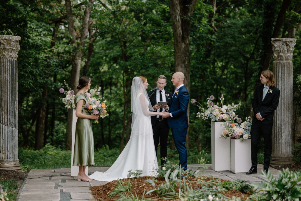 Bride and groom exchange their vows at Salisbury House & Gardens garden wedding